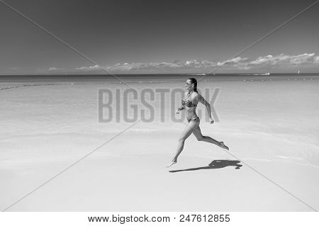 Run For Fun. Girl Or Woman In Sexy Bikini Run On Tropical Beach With White Sand, Turquoise Sea Or Oc