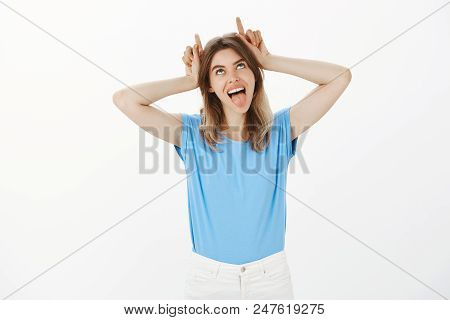 Girl Being Stubborn Like Goat Feeling Amused Pissing Off Boyfriend With Childish Behavior. Positive 