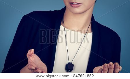 Close Up Woman Gesturing With Hands On Blue Background