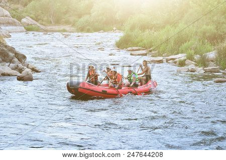 Ukraine Migea. 12 June 2018. Pivdenny Buh. A Group Of People Makes Rafting In The Waters Of The Rive
