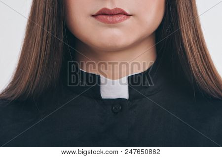 Cropped Photo: Close-up Of Clothing Items. Priest's Robe: Collar