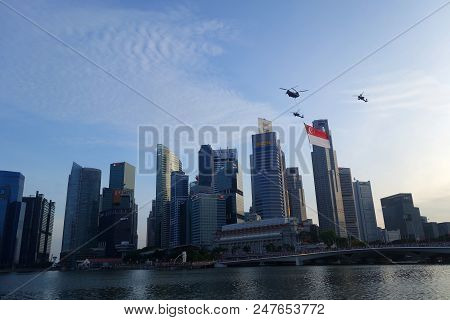 Singapore-june 17, 2018: The Flypast Of The Singapore Flag During The National Day Parade Practice. 