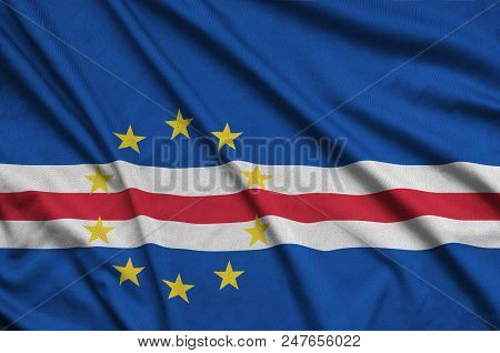 Cabo Verde Flag  Is Depicted On A Sports Cloth Fabric With Many Folds. Sport Team Waving Banner