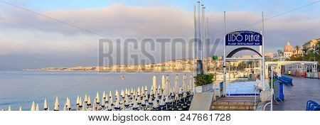 Lido Beach And Mediterranean Sea  And Famous Hotel Negresco In Nice France