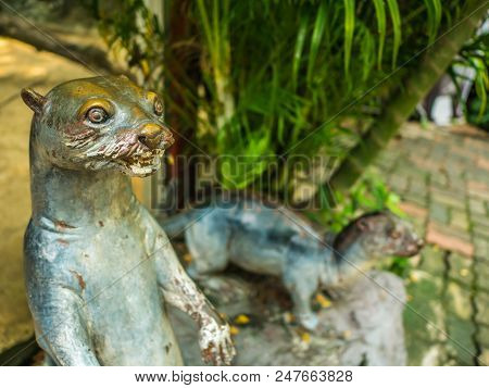 Two Otter Statue One Stand And One Crawl On The Floor In The Zoo Bangkok Thailand,otter Statue In Fr