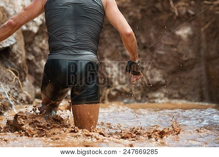 Mud Race Runners During Extreme Obstacle Races
