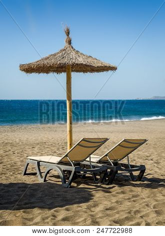 Furniture At Tejita Beach And Atlantic Ocean Shore. Tenerife, Spain.