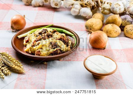 Traditional Belarusian And Ukrainian Cuisine. Potato Babka, Baked Cake Made Of Potato, Meat And Onio