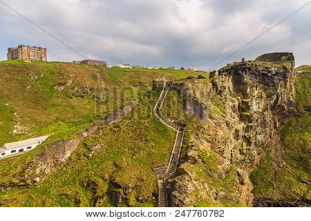 Tintagel, United Kingdom - May 02, 2014: View Of Tintagel Island And Legendary Tintagel Castle Ruins