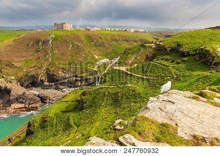 Tintagel, United Kingdom - May 02, 2014: View Of Tintagel Island And Legendary Tintagel Castle Ruins