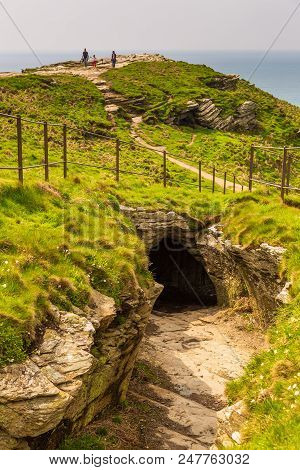 Tintagel, United Kingdom - May 02, 2014: View Of Tintagel Island And Legendary Tintagel Castle Ruins