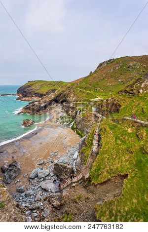 Tintagel, United Kingdom - May 02, 2014: View Of Tintagel Island And Legendary Tintagel Castle Ruins