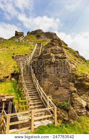 Tintagel, United Kingdom - May 02, 2014: View Of Tintagel Island And Legendary Tintagel Castle Ruins
