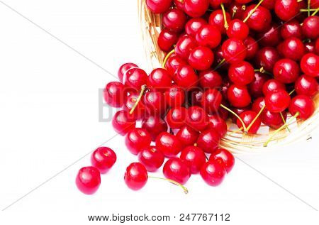 Red Ripe Cherry On A Background