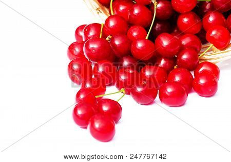 Red Ripe Cherry On A Background