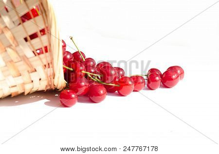 Red Ripe Cherry On A Background