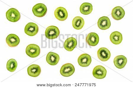 Creative Layout Made Of Kiwi Fruits Snd Mint Leaves. Many Slices Of Ripe And Juicy Kiwifruit. Flat L