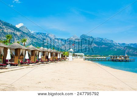 Wooden Beach Pavilions On The Shore Of A Sandy Beach - The Mediterranean Coast, Beldibi, Antalya, Tu