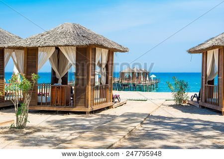 Wooden Beach Pavilions On The Shore Of A Sandy Beach - The Mediterranean Coast, Beldibi, Antalya, Tu