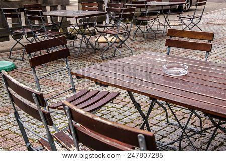 Empty Beergarden Without Visitors On A Rainy Day In Germany
