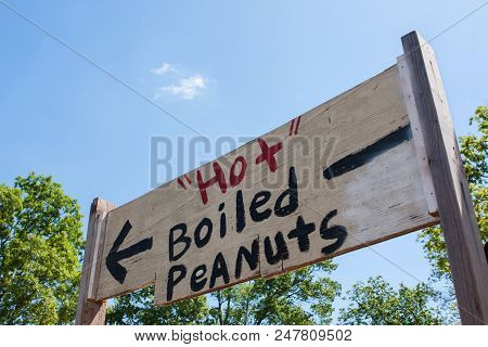 Sign Points Toward The Sale Of Hot Boiled Peanuts At An Antique Festival In Braselton, Ga.