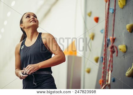 Fitness, Extreme Sport, Clibbing, Female And Healthy Lifestyle Concept - Young Woman With Chalked Ha