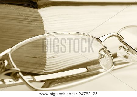 Book And Glasses