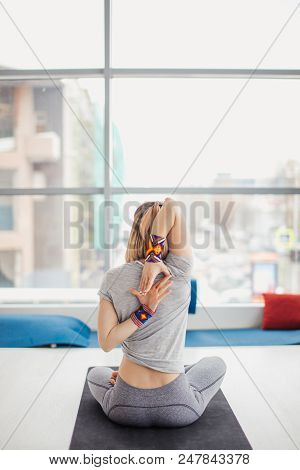 Close Up Of Female Hands Behind The Back, Woman Practicing Yoga, Sitting In Cow Face Exercise, Gomuk