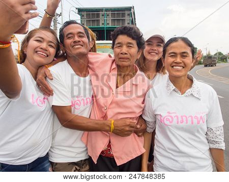 Family Selfie, Local People Participate On The Way To The Temple. Thai Buddhist Culture. Annual Dona