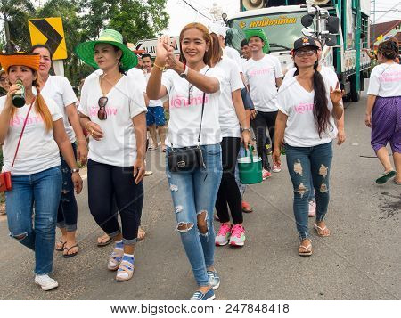 Group Dancing. Local People Participate On The Way To The Temple. Thai Buddhist Culture. Annual Dona