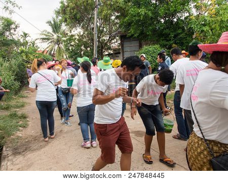 Group Dancing. Local People Participate On The Way To The Temple. Thai Buddhist Culture. Annual Dona