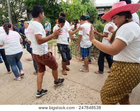 Group Dancing. Local People Participate On The Way To The Temple. Thai Buddhist Culture. Annual Dona