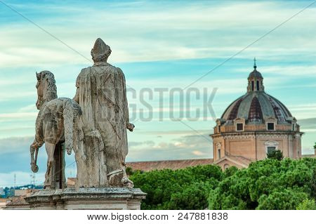 Statue Of The Dioscuri Polluce And Castore On Capitoline Hill From Behind Rome. Italy