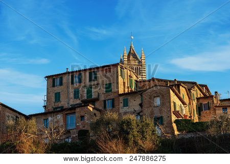 Bell Tower Of The Siena Cathedral, Santa Maria Assunta 1220-1370 And Old Houses. Toscana (tuscany), 
