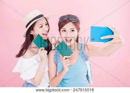 Two Beauty Woman Selfie Happily With Travel Concept On The Pink Background