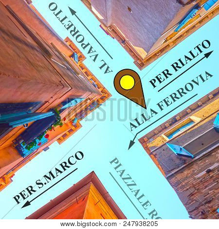 Venice map - street crossing upside down and traditional venetian arrows to touristic destination