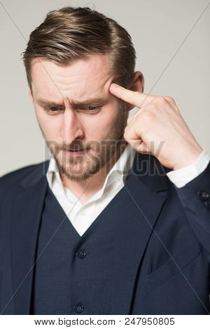 Guy Feels Awful Because Forgot Important Significant Date. Man Suffering Face Headache Pain Trying T