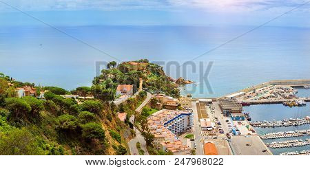 Convent Of Blanes On Top Of Punta Santa Anna. View On Balearic Sea And Seaport With Fishing Boats An
