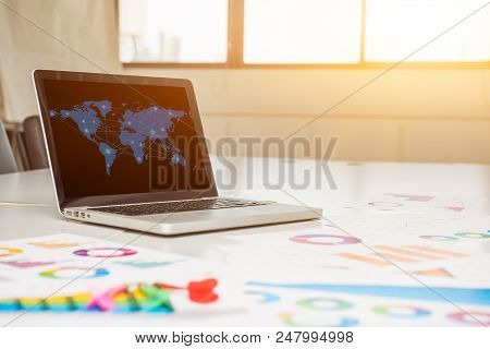 Laptop On The Table In The Meeting Room. Fintech And Technology