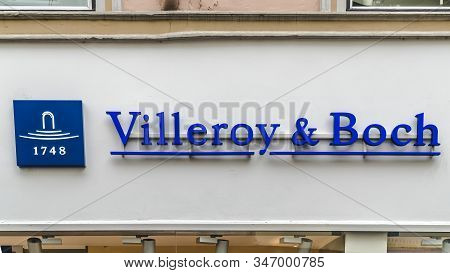 Trier, Germany - September  13, 2019: Shop And The Logo Of The Brand On A House Facade 