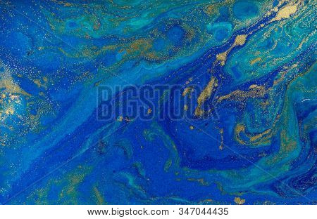 Marbled Blue And Gold Abstract Background. Liquid Marble Pattern.