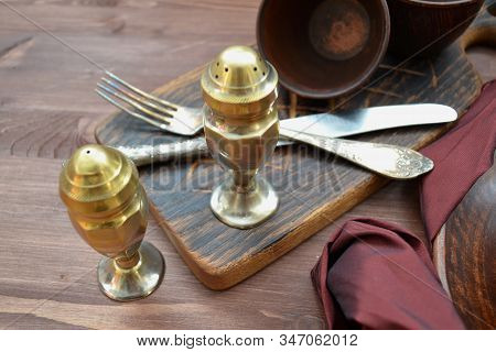 Antique Slave Pottery And Kitchenware On Wooden Table