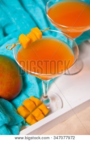 Glasses Of Tropical Exotic Multifruit Mango Juice Cocktail Drink On The White Tray. Tripical Beach P