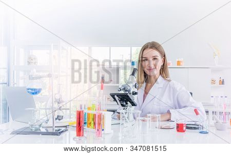 Pretty Scientist Work Reserching In Chemical Laboratory, Science And Healthy Or Medical Concept