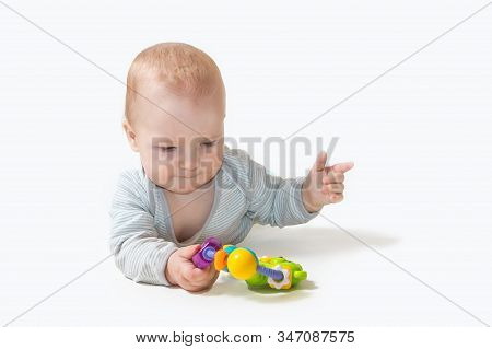 Baby Boy Is Playing With Toy Showing 