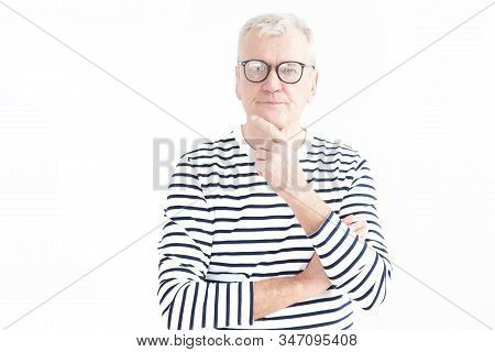 Thinking Elderly Man Studio Portrait With Copy Space