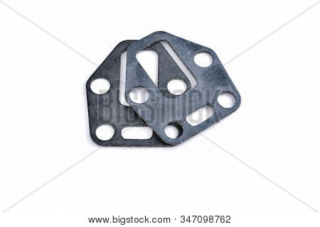 Gasket Automobile Paronite Auto Part On A White Background Close-up