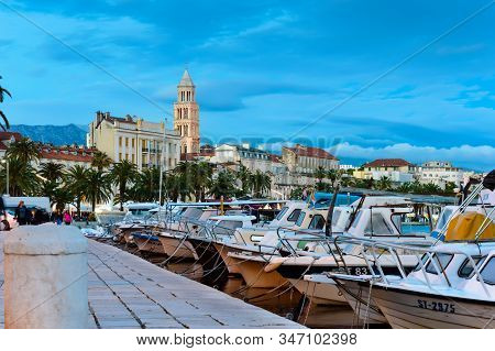 Split, Croatia - May 21, 2019: Beautiful Riva Promenade With Palm Trees Near Matejuska Port With Sma