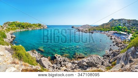 Ladiko Bay With Ladiko Beach With Sun Beds And Sun Shades (rhodes, Greece)