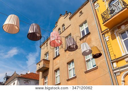 Chelmno, Poland - August 17, 2019: Decorative Lanterns On The Street Under Blue Sky. Poland
